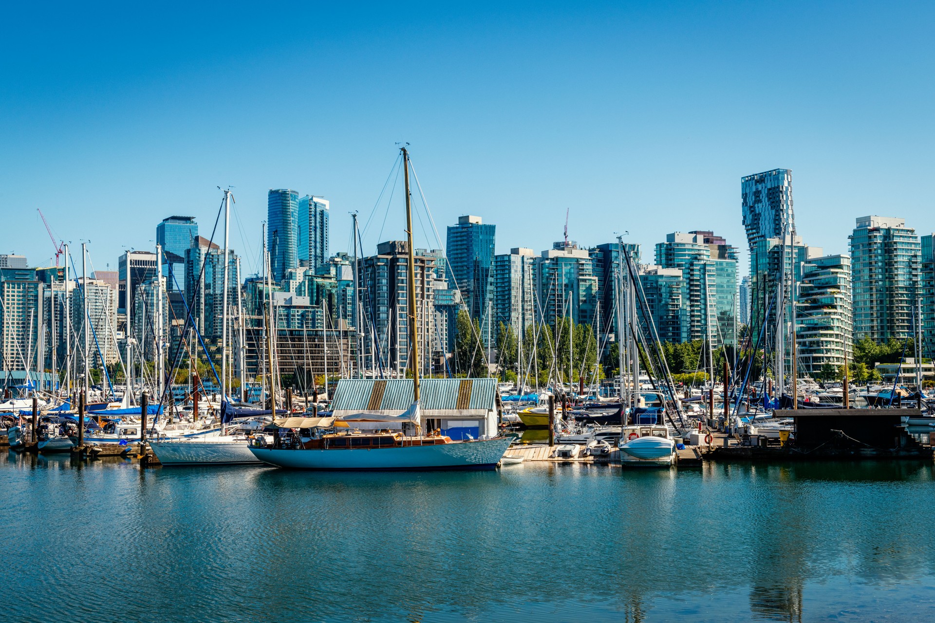 sailing ships and skyscraper in Vancouver in Canada